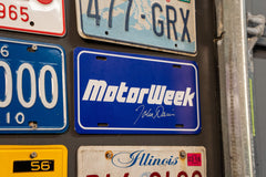John Davis Autographed MotorWeek License Plate